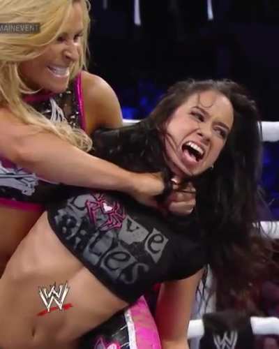 Natalya stretching AJ