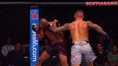 Dustin Poirier displays excellent striking accuracy as he hurts Eddie Alvarez and ends the combination with a knee downtown.