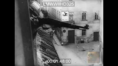 Newsreel footage highlights the civilian uprising against the Nazi garrison in Prague - May 1945