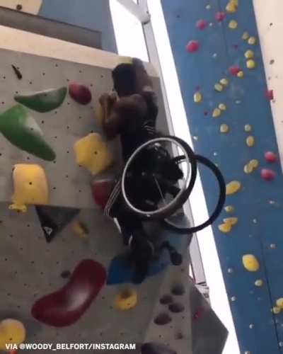 Wheelchair athlete Woody Belfort shows incredible strength climbing a wall