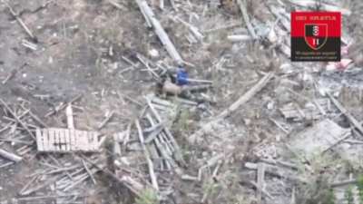 Russian soldier put grenade under himself and tried to perform perfidy by  fake-<wbr>surre<wbr>nderi<wbr>ng to ukrainian soldiers, but his actions were spotted with UAV and he was eliminated on the spot.