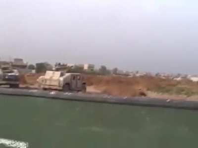 Intense moment of an RPG nearly hitting US troops during a firefight between Iraqi Insurgents and the 2/24 Marines in Yusufiyah, Iraq