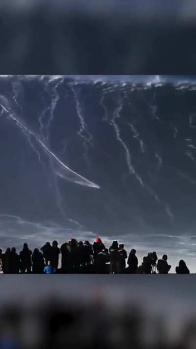 This German pro surfer rides 115-ft wave in Portugal