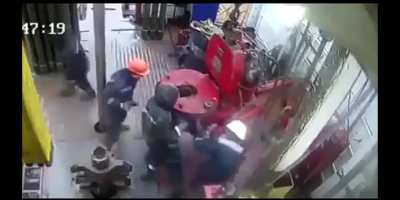 Worker's hand gets crushed by rotating machine on an oil platform in Russia