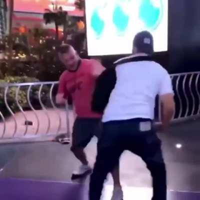 Racist prick and sidekick get handled by good hombres.