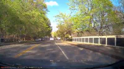 Idiot crosses double yellow line to go around me, almost crashes head on, and proceeds to blow the red light. Luckily the challenger or the Jetta decided not to swerve into my lane to avoid him.