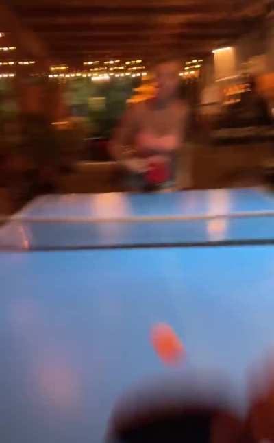 Flashing tits between two rounds of ping-pong