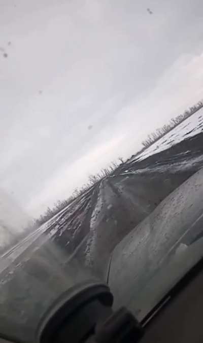 ru pov: Ukrainian soldiers drive road out of Bakhmut showing number of destroyed Ukrainian vehicles