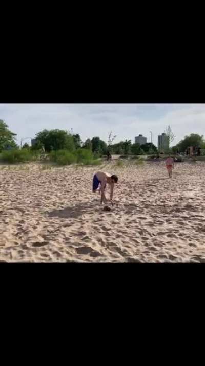 Guy throws football at someone behind the camera