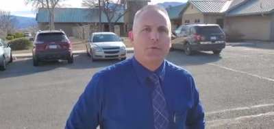 Guy orders Drunk police detective back into the police station.