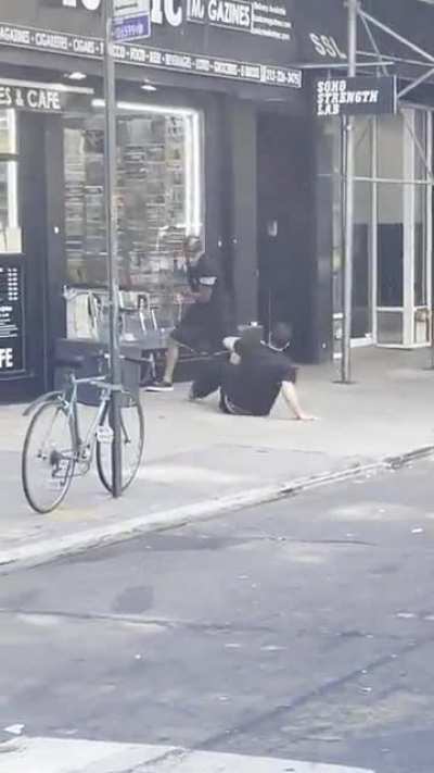 Man pulls out a taser during fight in soho