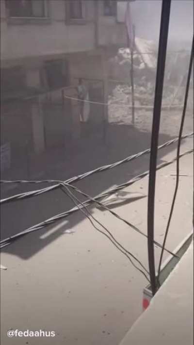 Palestinian family hides in fear as bombs explode all around their neighborhood
