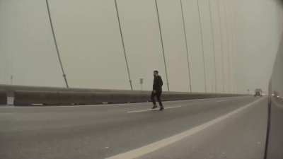 Cement truck narrowly misses man on Port Mann Bridge, Vancouver