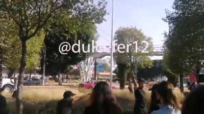 Maskless nazi gets driven out of womens march in Mexico.