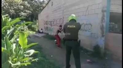 Columbian Police Officer Shoots a Man For Brandishing a Machete