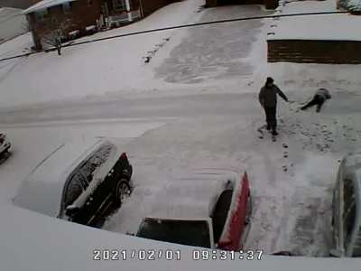 Shot over snow shoveling