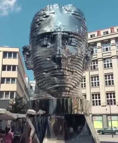 Rotating 42 layer sculpture of Franz Kafka by David Cerny