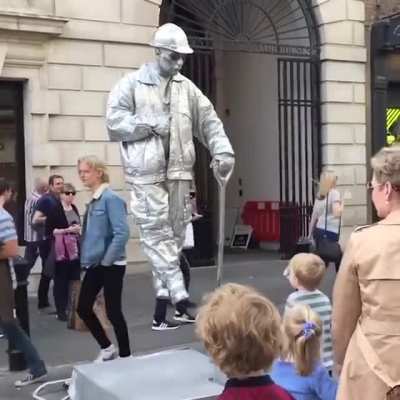This street performer - who cares if it's rigged, it looks insane