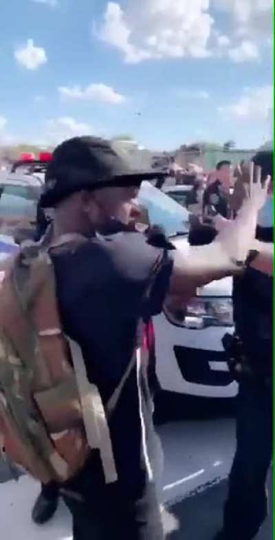 Police pepper spray a dude.