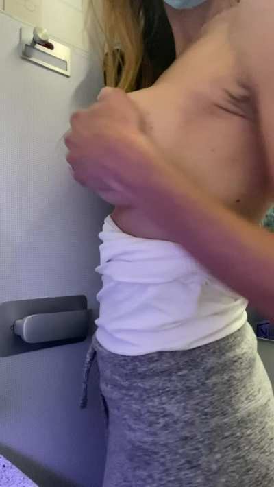 Showing her tits