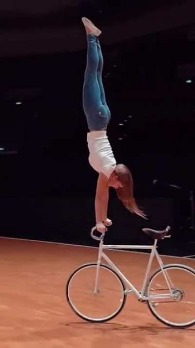Handstand on a moving bike