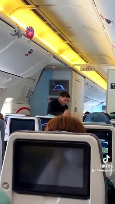 Dumbfuck tries to impress the ladies by shadowboxing inside a plane