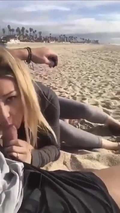 Sucking cock on the beach
