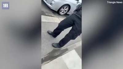 Man in Britain draped his car in a Palestinian flag while waiting to pick up his sister from school. Zionist Karen shows up, harasses him, and calls the cops. Ten cops arrive in six cars to fine him for causing her and other parents 