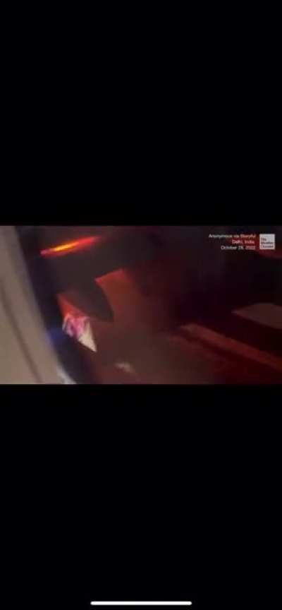 Plane leaving Delhi, India is forced to return to runway after sparks from engine were seen.