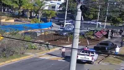 Truck hauling dirt loses control