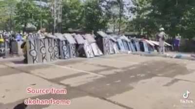 Myanmar anti-coup protestors practising shield formations.