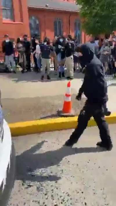 Peaceful protest until people dressed in black started riots and lit cop cars on fire.