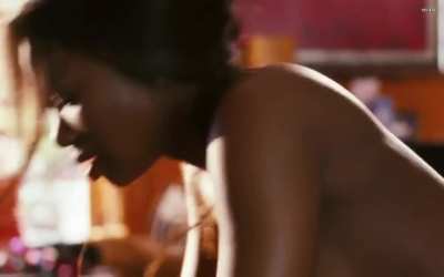 Naturi Naughton as Lil' Kim riding The Notorious B.I.G. in 'Notorious'