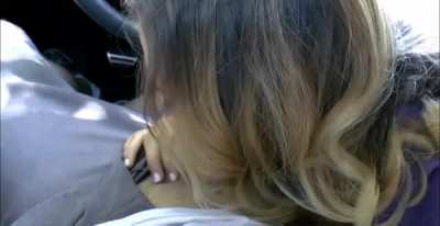 She blows him in a car
