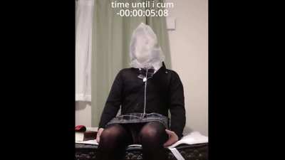 Bagged crossdresser has HFO in flat chastity cage