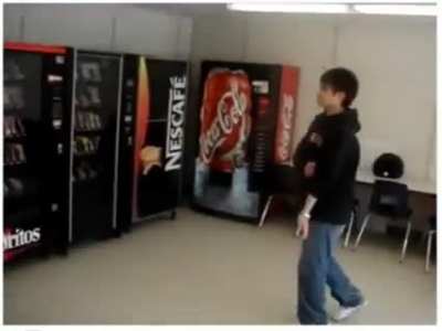 Kid hits a vending machine with 