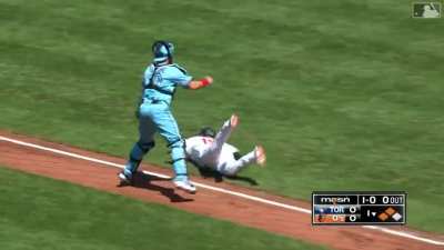 Travis Shaw fields a sharp grounder to third and delivers a strong throw to the plate to nab Chance Sisco in the 1st inning