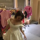 Milana Looking Lovely in a White Dress