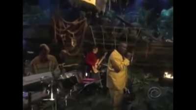 Sekou singing the winners at war song.