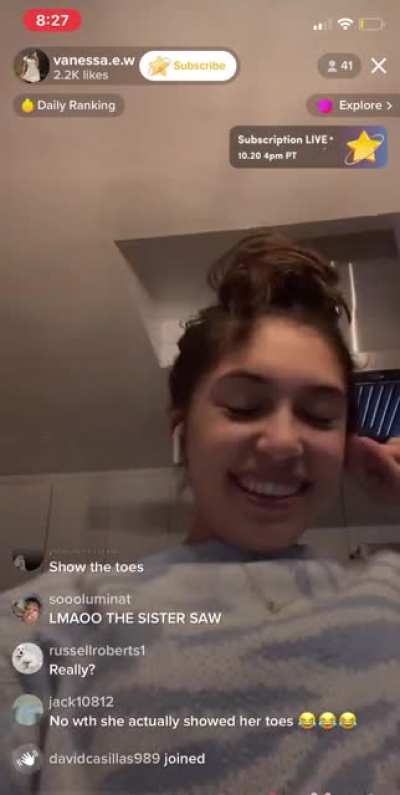 girl shows bottom of soles on live