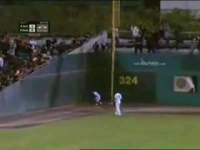 Ball girl climbs wall like spiderman to catch the ball