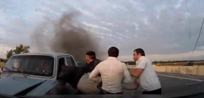 Bystanders rescue older people from a car accident