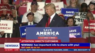 Orange Hitler spreads fascist propaganda while his cult raises their hands for the new 1 finger Nazi salute