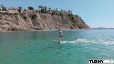 Beautiful Dolly Dyson shows off her surfing skills as well as her fit body