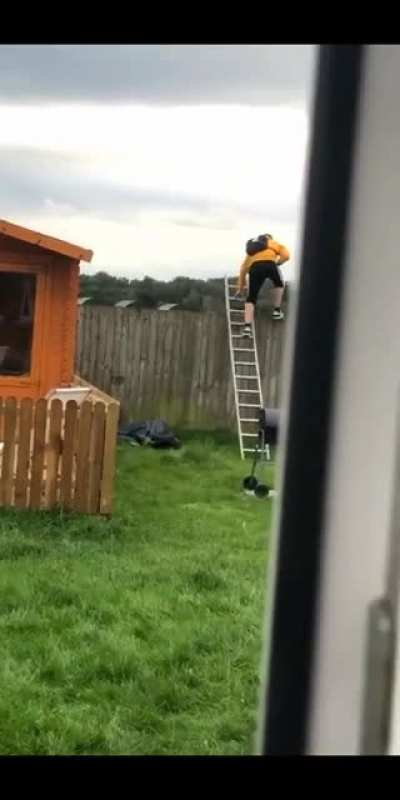 Using a ladder to get over a fence