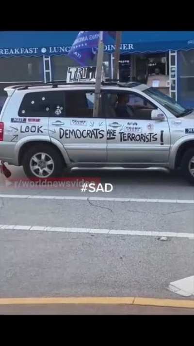 A Trump supporter drives up