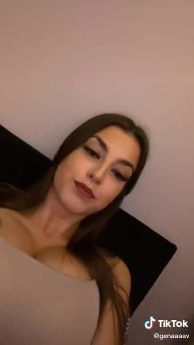 Kissing her boobs