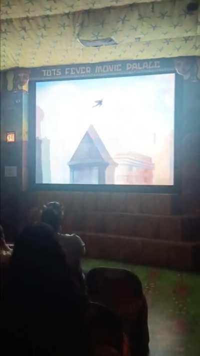 Watching old Superman cartoons in this little theater at the museum.