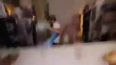 The way that watermelon knocks him out of the chair