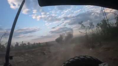 while being medevac a Ukrainian soldier films the moment of a Russian FPV kamikaze drone missing them